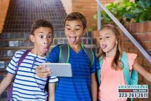 Should Cellphones be Banned by Law in Schools?